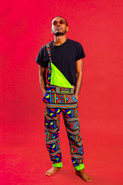 Man wearing African print unisex dungarees