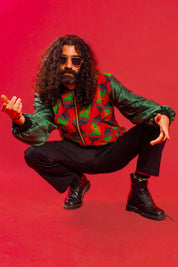 Man in trippy festival bomber jacket