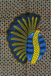 African wax print fabric featuring a repeating pattern of bold banana seed motifs in blue, yellow, and black. Each seed design has a fan-like shape on one side and a curved oval on the other, set against a detailed geometric background of small cream and brown triangles. The vibrant colours and symmetrical layout make this fabric ideal for striking garments or accessories.