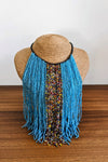 long blue beaded necklace