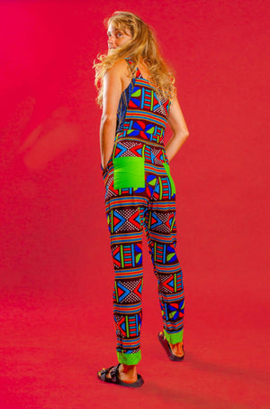 Woman wearing African print unisex dungarees