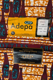 African wax print fabric with a repeating motif of six brown bottles in each cluster, arranged in neat rows across a textured orange and white background. The design includes the words &quot;6 BOTTLES&quot; and &quot;6 BOUTEILLES&quot; in teal lettering, alternating in English and French. A quirky and bold print, perfect for playful fashion or unique home decor. Made by GTP ( Ghana textile production)