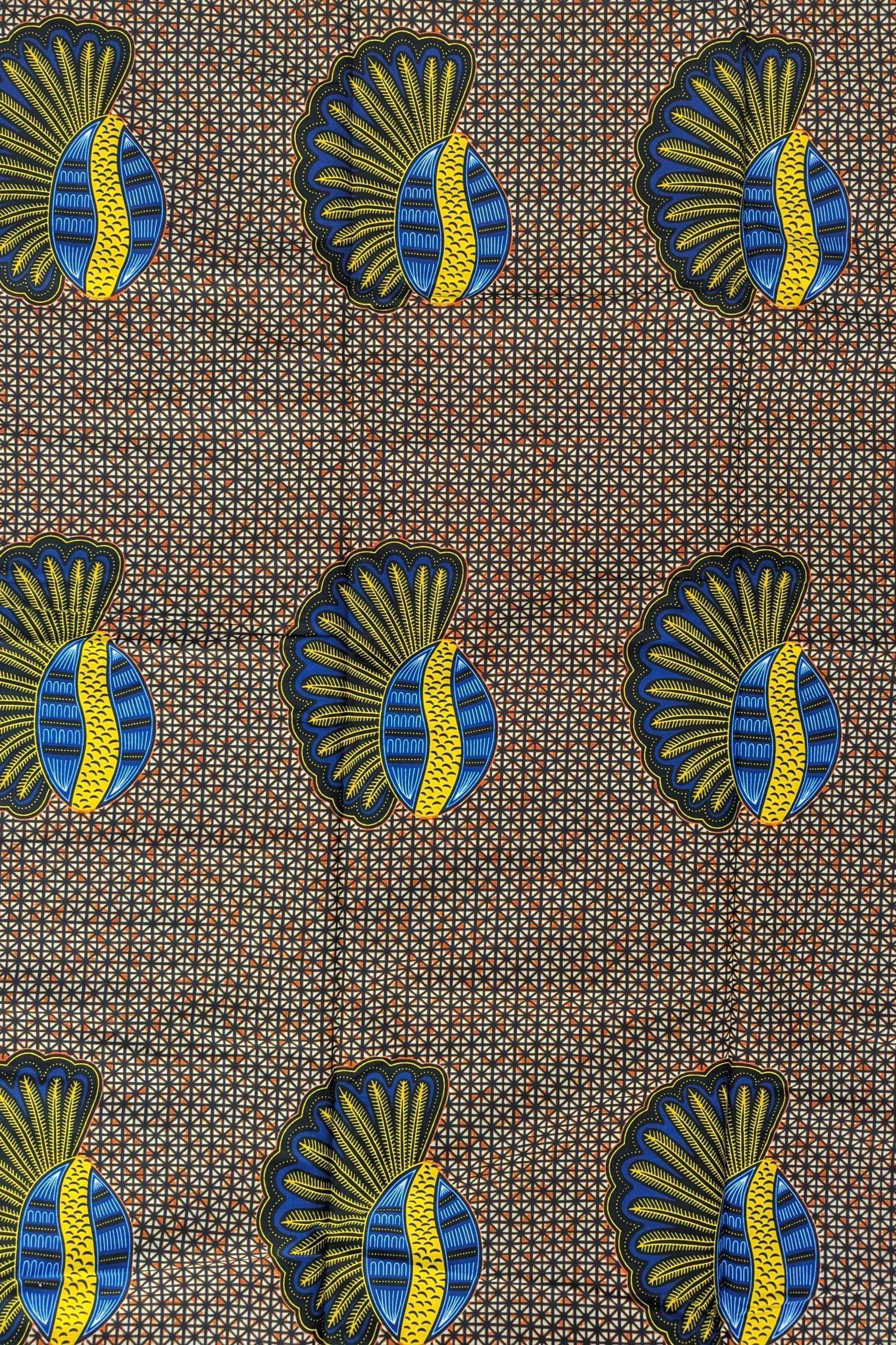 African wax print fabric featuring a repeating pattern of bold banana seed motifs in blue, yellow, and black. Each seed design has a fan-like shape on one side and a curved oval on the other, set against a detailed geometric background of small cream and brown triangles. The vibrant colours and symmetrical layout make this fabric ideal for striking garments or accessories.