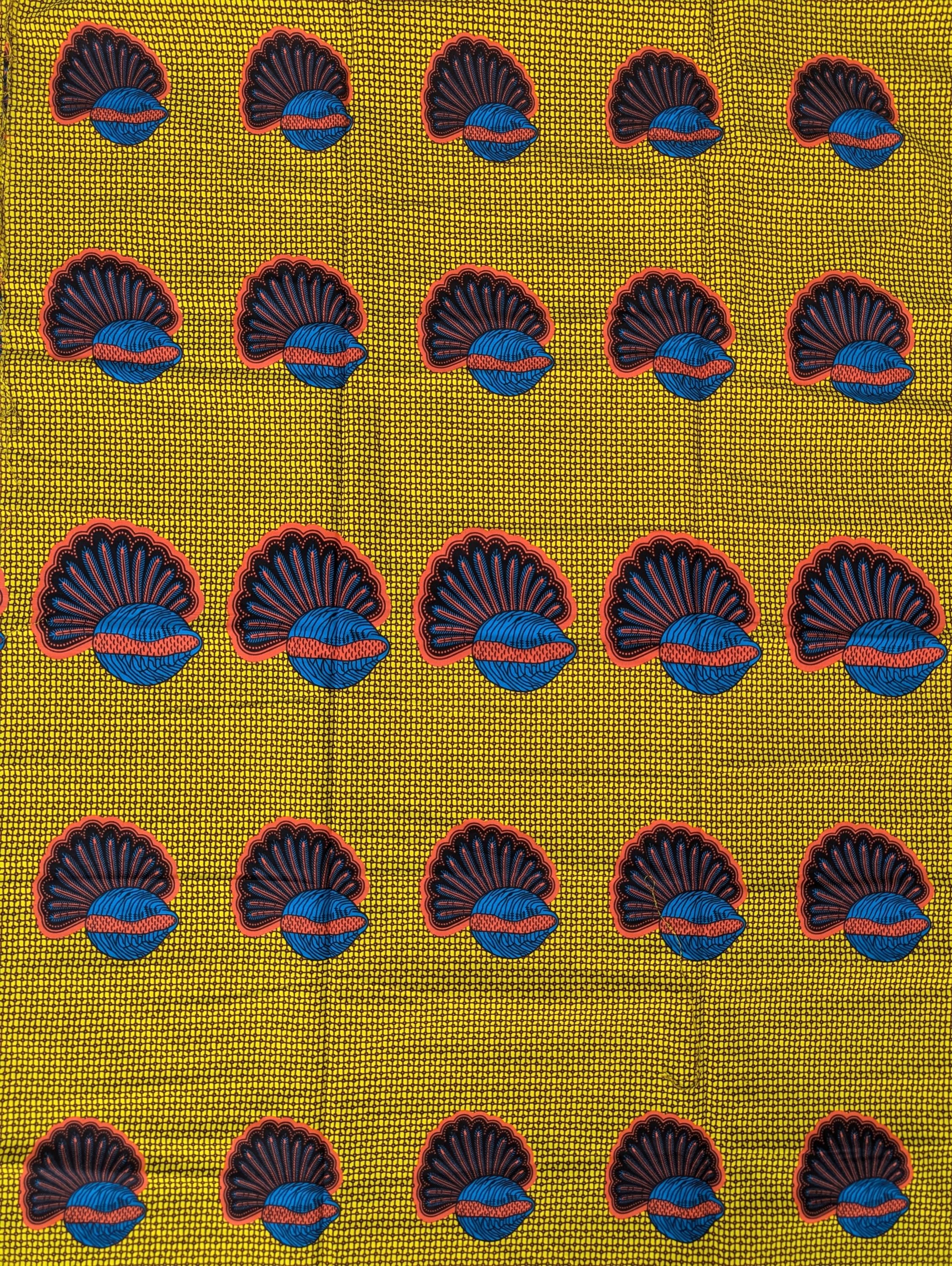 African wax print fabric featuring a repeating pattern of abstract banana seed motifs in deep blue and brown with red accents, set against a vibrant yellow background with a fine grid-like texture. The rounded, fan-like shapes are evenly spaced, creating a bold and structured design ideal for statement fashion, accessories, or decor.